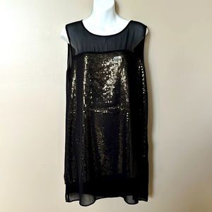 Melanie Lynn Black top/dress with sheer black and gold sequence detail